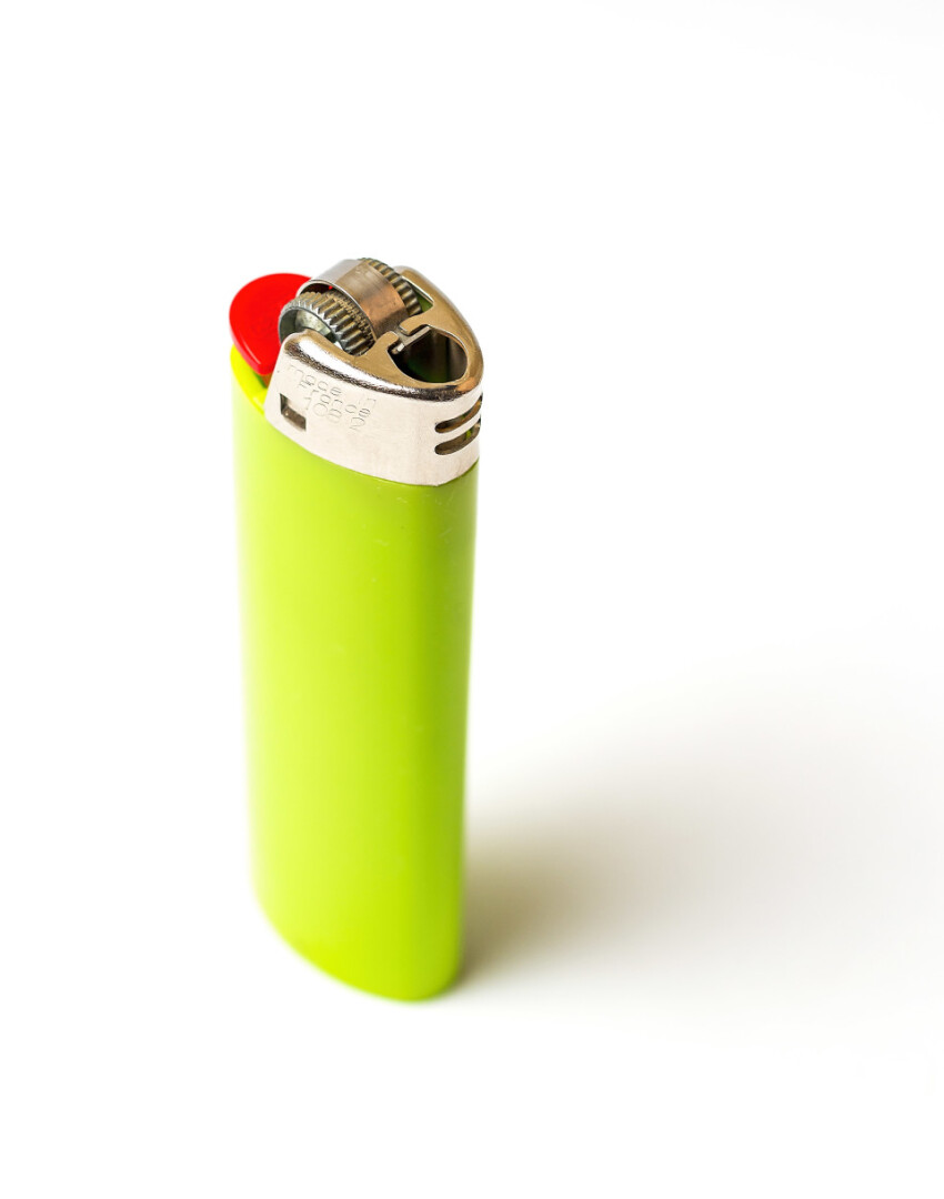 green lighter isolated on white background