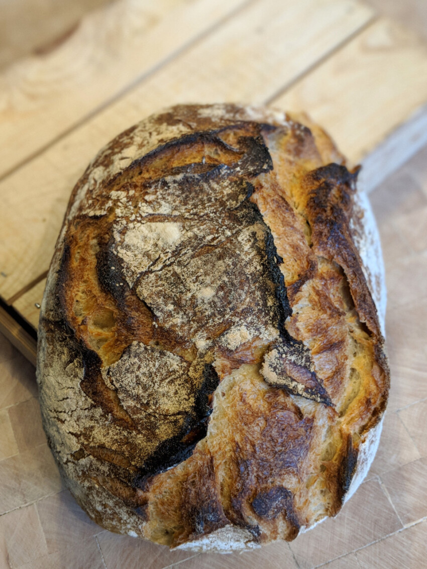 bakery bread on a wooden board and table