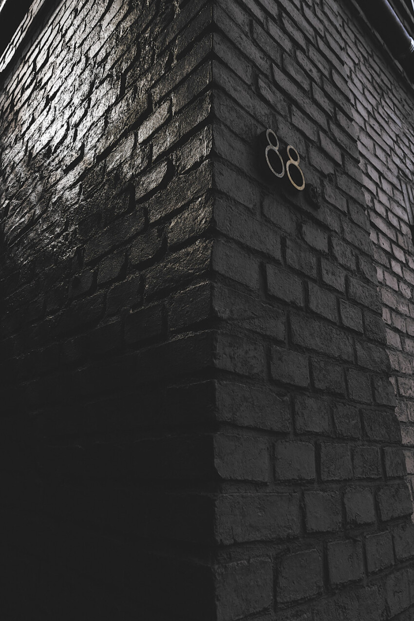 number 88 beautiful light on brick house wall