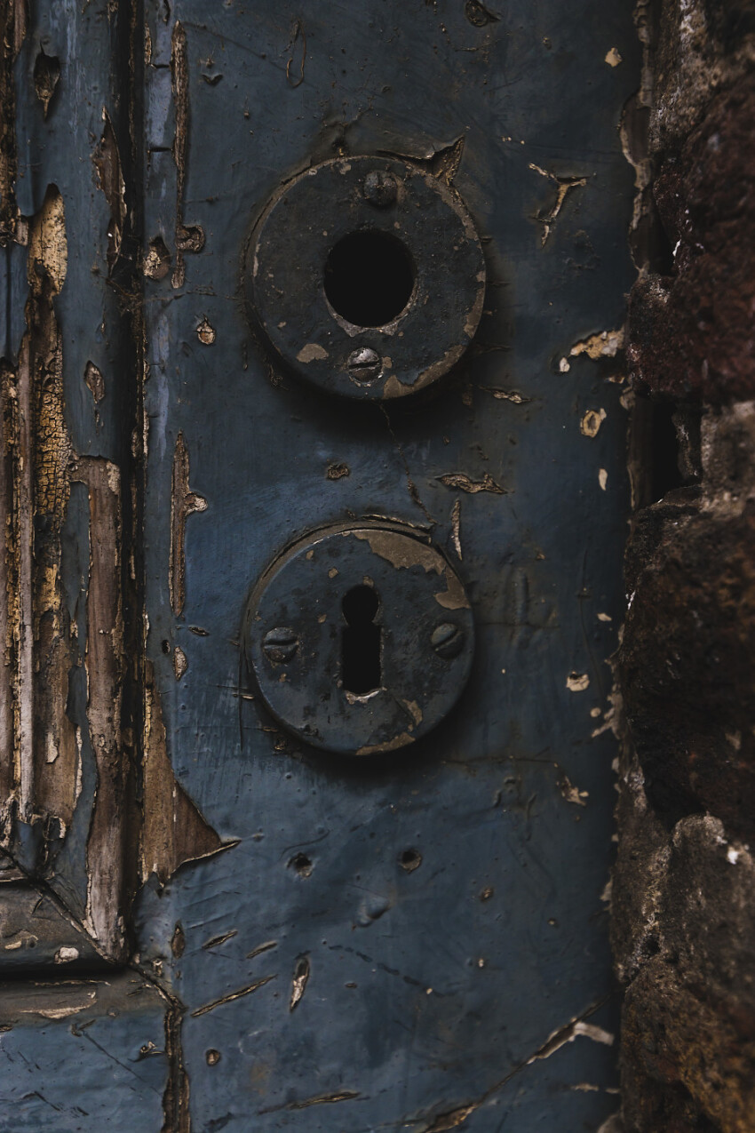 old blue weathered door lock