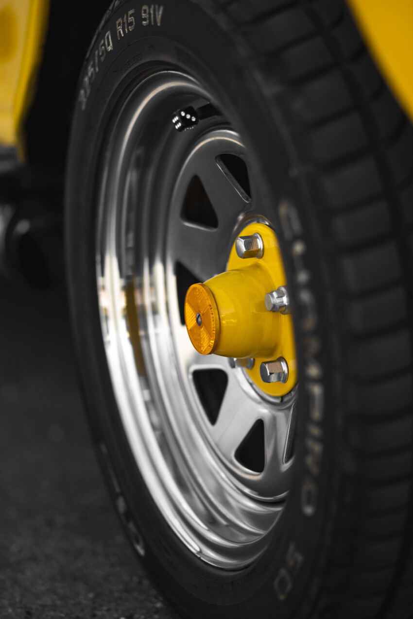 car tire of a yellow classic car