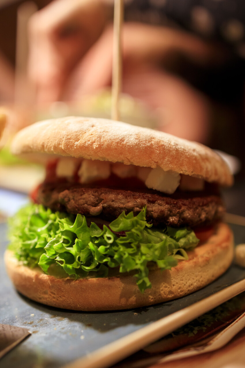 Beef burger with cheese and vegetables