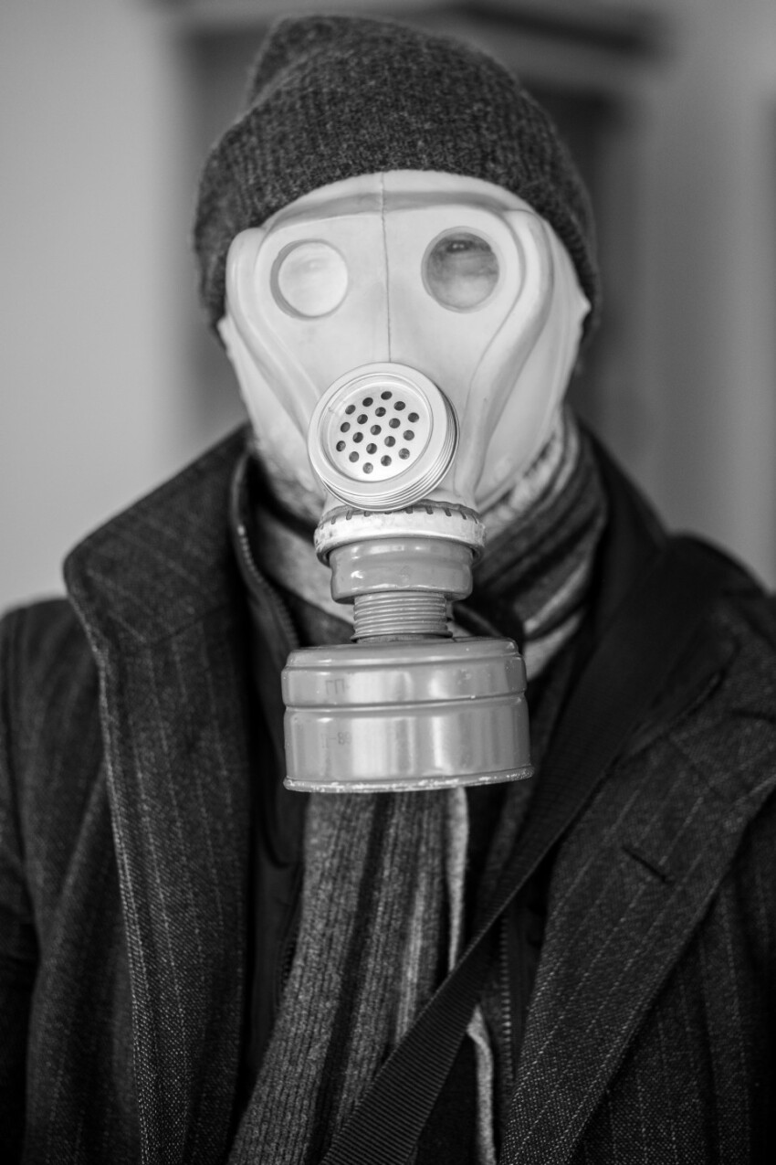 Man with gas mask goes to work