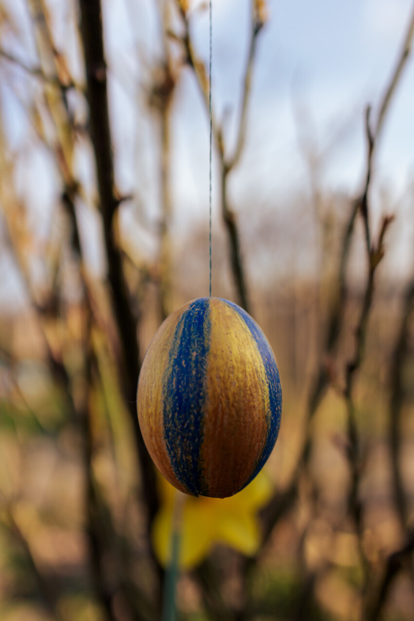 Blue and gold striped decorated Easter egg