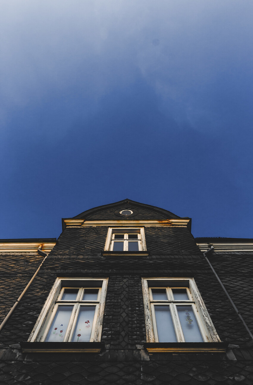 Slate stone house under blue sky