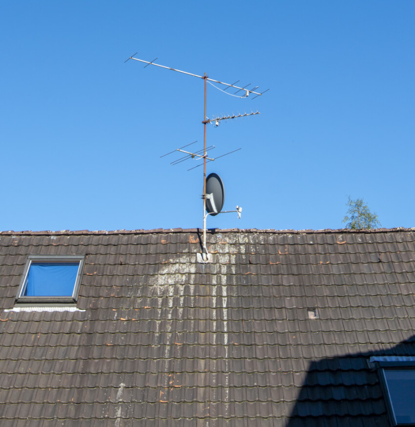 Satellite Dish and Antenna TV on Blue Sky