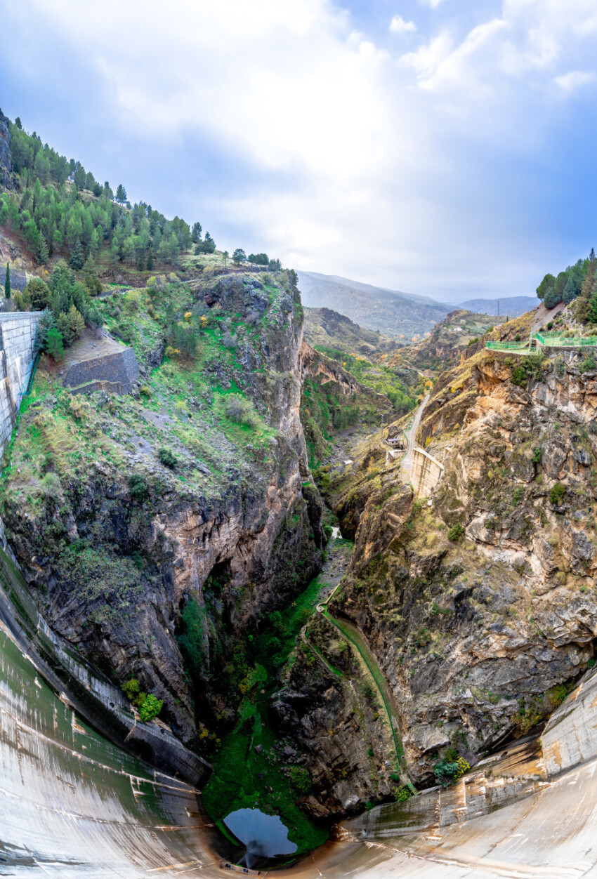 Looking down from a gigantic dam in Sierra Nevada