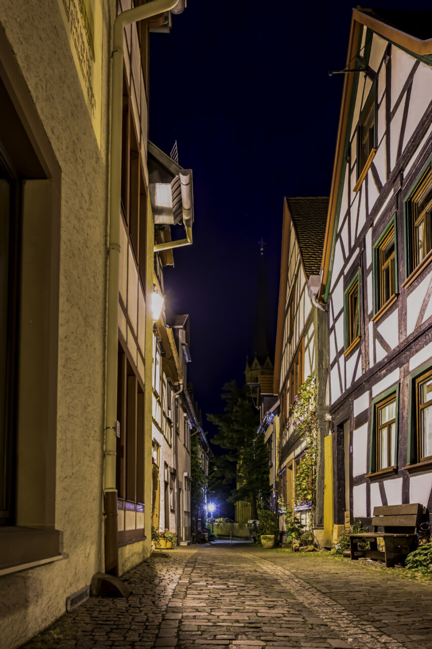 medieval alley at night - gelnhausen, frankfurt am main in germany