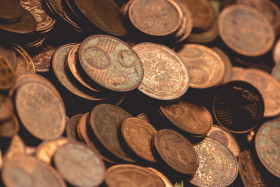 Stock Image: 1 cent euro coins, 2 cent euro coins and 5 cent euro coins. Pile of euro cent coins.