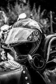 Stock Image: A motorcycle helmet secured with a lock