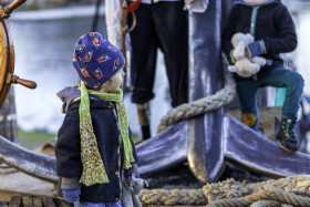 Stock Image: A toddler experiences an adventure on a pirate ship