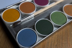 Stock Image: Artist's watercolour palette with brush