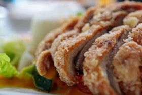 Stock Image: Asian crispy duck with curry sauce