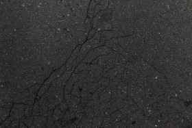 Stock Image: asphalt texture with big cracks
