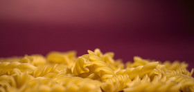 Stock Image: background of fusilli pasta noodles