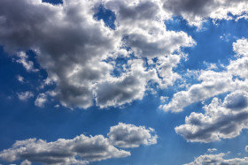 Stock Image: Beautiful Blue Sky with fluffy Clouds