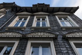 Stock Image: beautiful old slate stone house facade