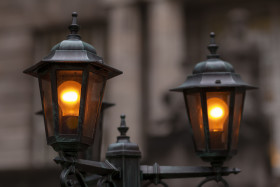 Stock Image: Beautiful streetlight in front of a old building in germany