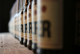 Stock Image: Beer bottles in a row