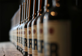 Stock Image: Beer bottles in a row