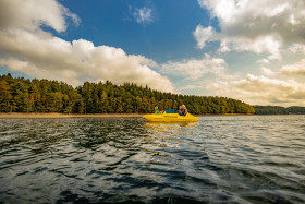 Stock Image: Bevertalsperre yellow boat on a lake