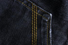 Stock Image: Black denim cloth texture background