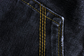 Stock Image: Black denim cloth texture background