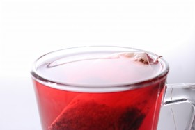 Stock Image: Black tea in glass cup