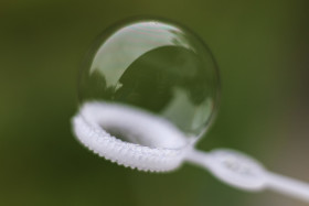 Stock Image: blowing soap bubbles game