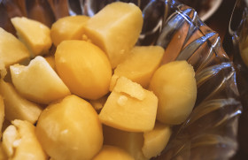 Stock Image: boiled potatoes in glass bowl