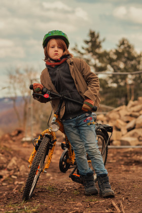 Stock Image: Boy with his yellow bike