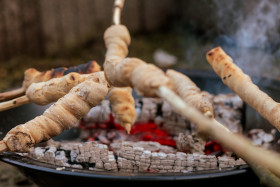 Stock Image: Bread on sticks over the fireplace