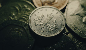 Stock Image: British pound money coin background greenish