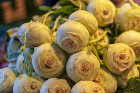 Stock Image: Bulbs of fresh fennel vegetable on market stall for sale