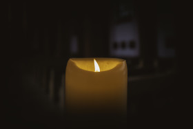 Stock Image: candle in the dark