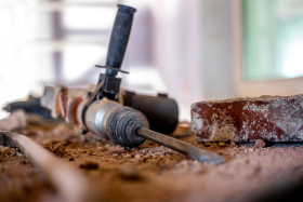 Stock Image: Caulking hammer on construction site