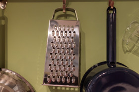 Stock Image: Cheese grater in a kitchen