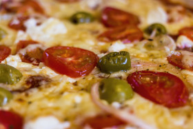 Stock Image: cheesy fresh pizza