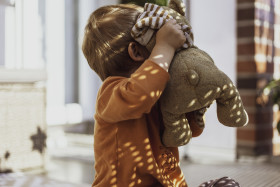 Stock Image: child with beloved teddy