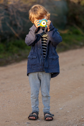Stock Image: Child with camera in front of face