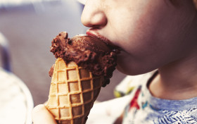 Stock Image: child with chocolate ice cream