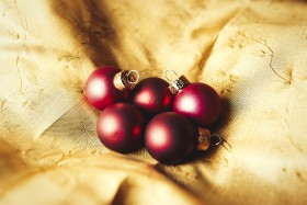 Stock Image: christmas balls on golden velvet