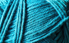 Stock Image: Close up the blue yarn thread as abstract background
