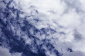 Stock Image: clouds with dark blue sky