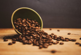 Stock Image: coffee beans in a cup