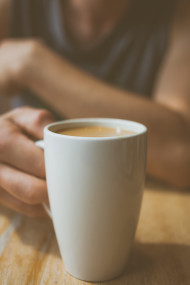 Stock Image: coffee cup in hand