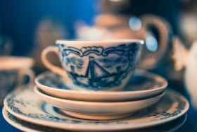 Stock Image: Coffee cup with sailboat on it