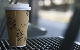 Stock Image: coffee to go at the train station