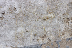 Stock Image: Concrete wall with large signs of wear background