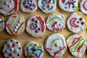 Stock Image: Cookies with icing decorated with colorful cute faces